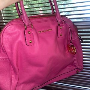 Bright pink Michael Kors bag
